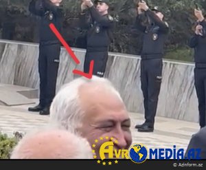 Şəhid dəfni zamanı gülən iş adamı kimdir?