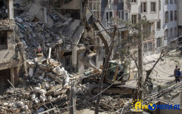 İsrailin zərbəsindən sonra İranda bina uçdu - 60 ölü